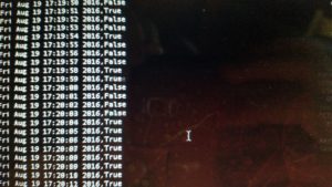 Photo of a command prompt terminal displaying sample output.  Sample output is date stamp on the left followed by a true or false value, separated by a comma.  The time stamps are a second apart, and true/false values vary through the data.