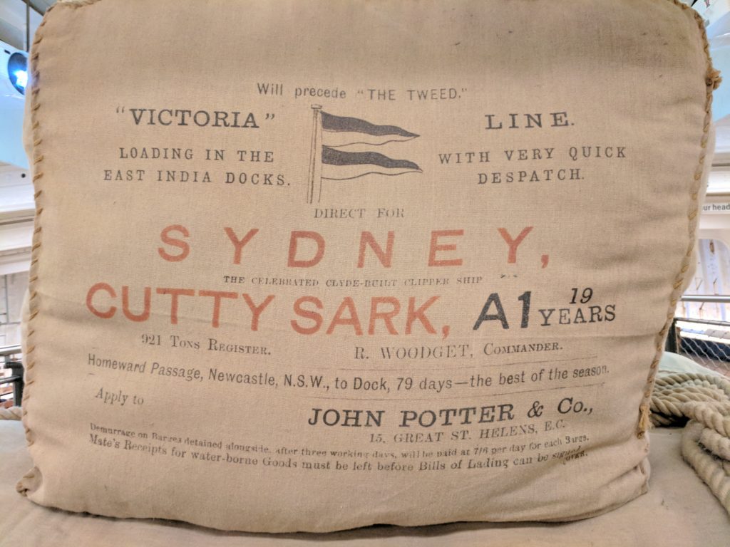 A bag representing some Cutty Sark cargo, also an ad for this fast ship